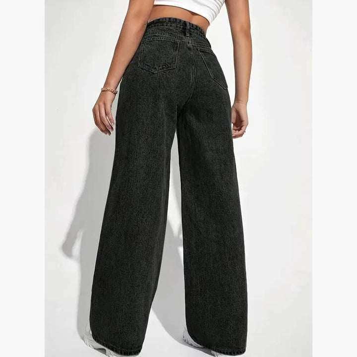 Högtaljede svarte jeans till dam