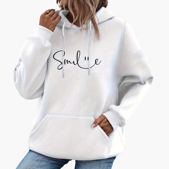 Caroline - Snygg Smile Graphic Hoodie för kvinnor