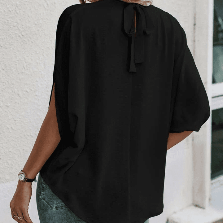 Damblus med Halvlange Ärmar och Eleganta Splittdetaljer