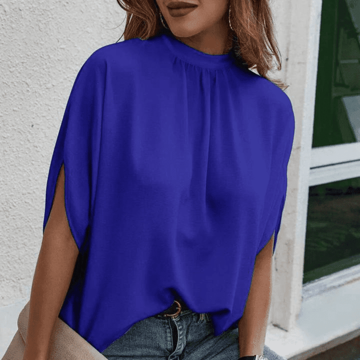 Damblus med Halvlange Ärmar och Eleganta Splittdetaljer