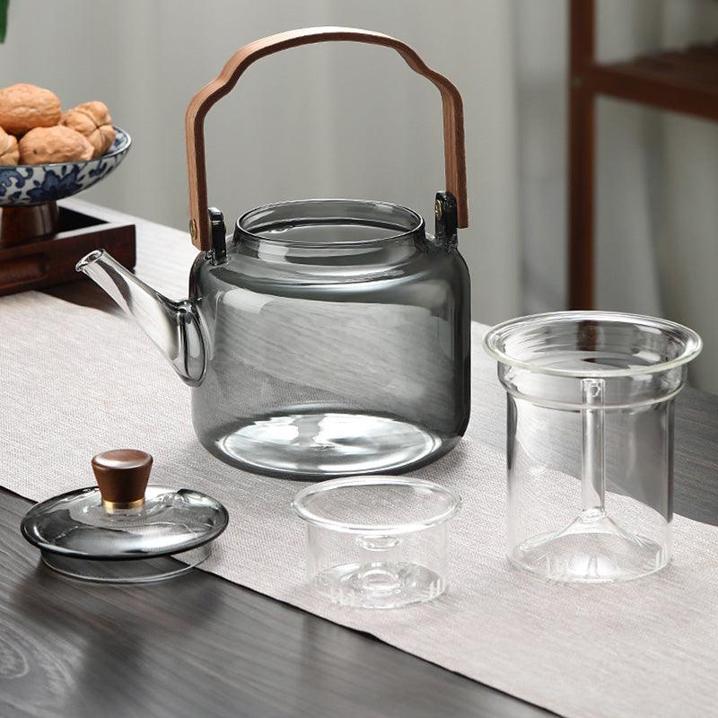 Teekanne i Glas med Trehåndtak – Elegant Design för Tedrikking