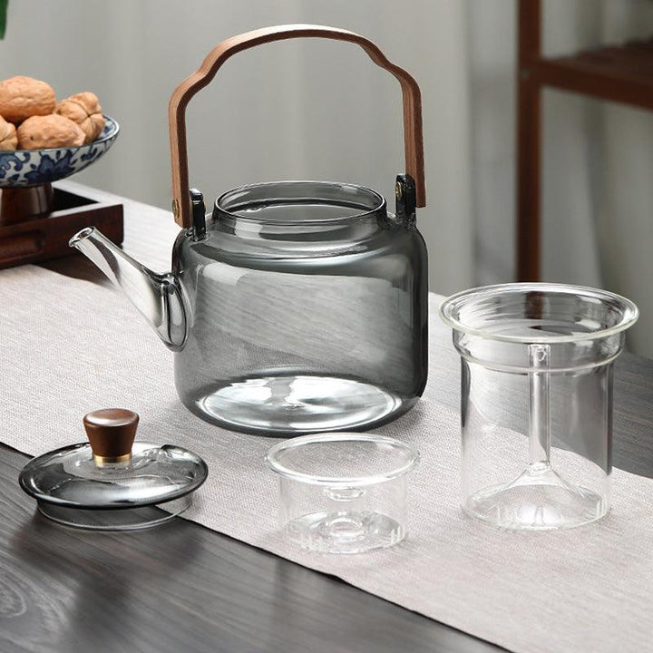 Teekanne i Glas med Trehåndtak – Elegant Design för Tedrikking