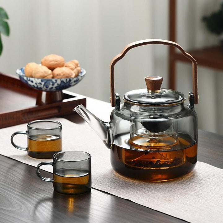Teekanne i Glas med Trehåndtak – Elegant Design för Tedrikking