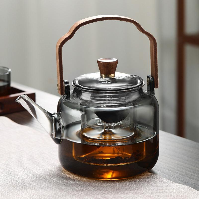 Teekanne i Glas med Trehåndtak – Elegant Design för Tedrikking
