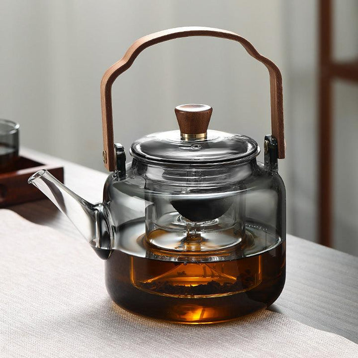 Teekanne i Glas med Trehåndtak – Elegant Design för Tedrikking