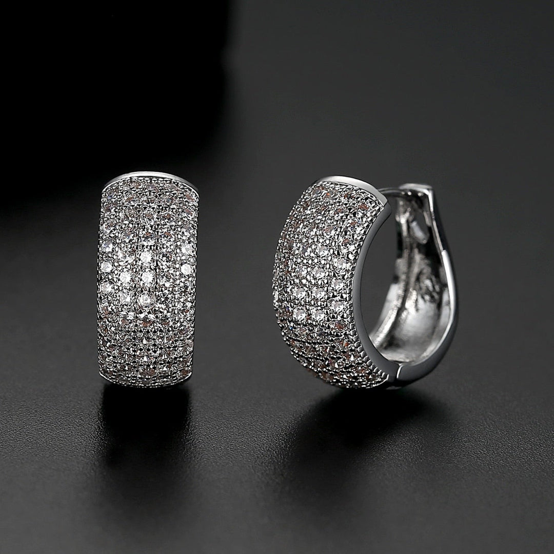 Kvinnor Huggie Hoop Öredobber i Sterling Silver