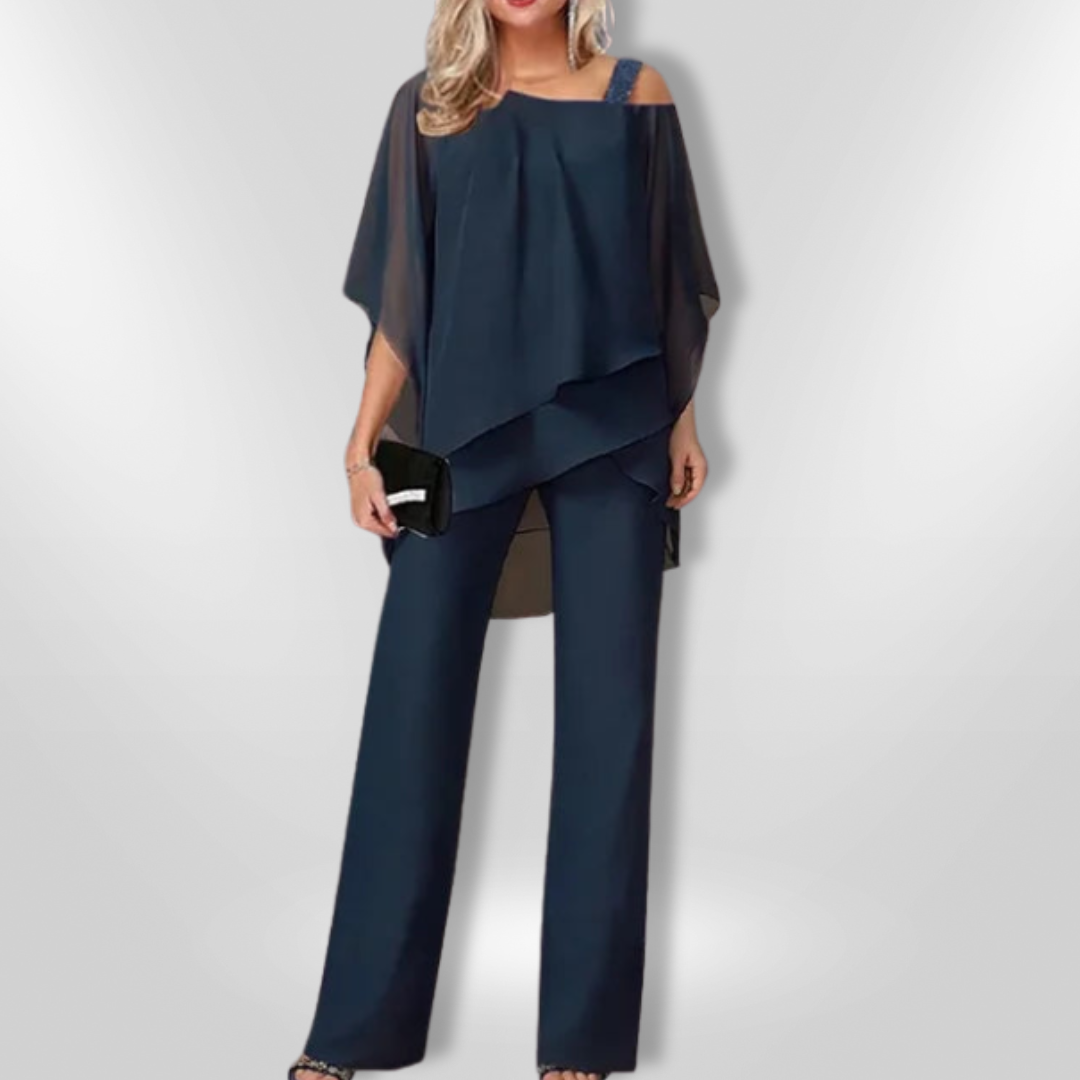 Elegant Kvinna Ensemble med Asymmetrisk Topp &amp; Bred Byxa