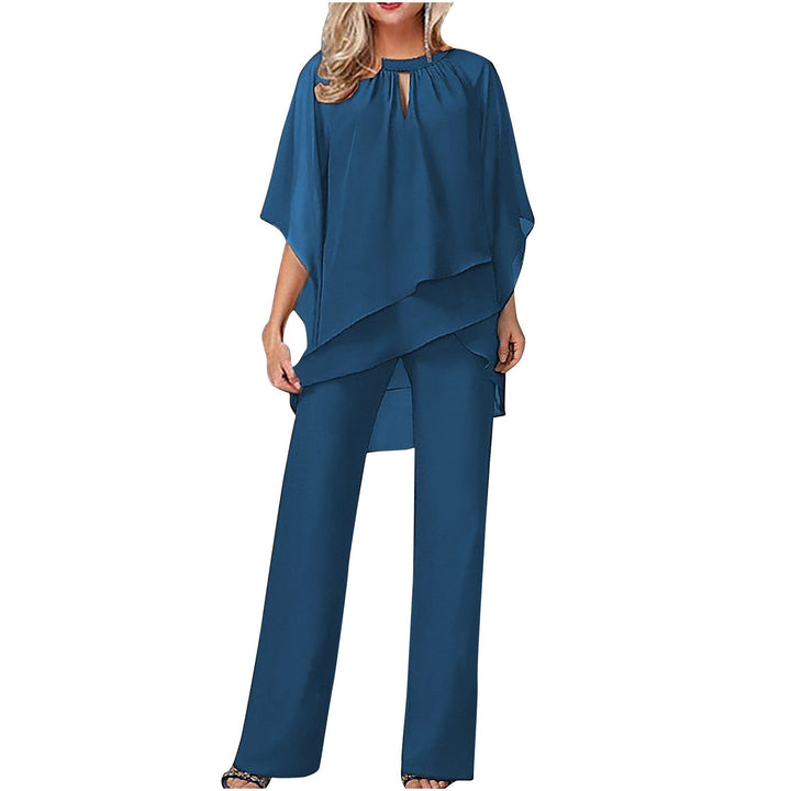 Elegant Kvinna Ensemble med Asymmetrisk Topp &amp; Bred Byxa