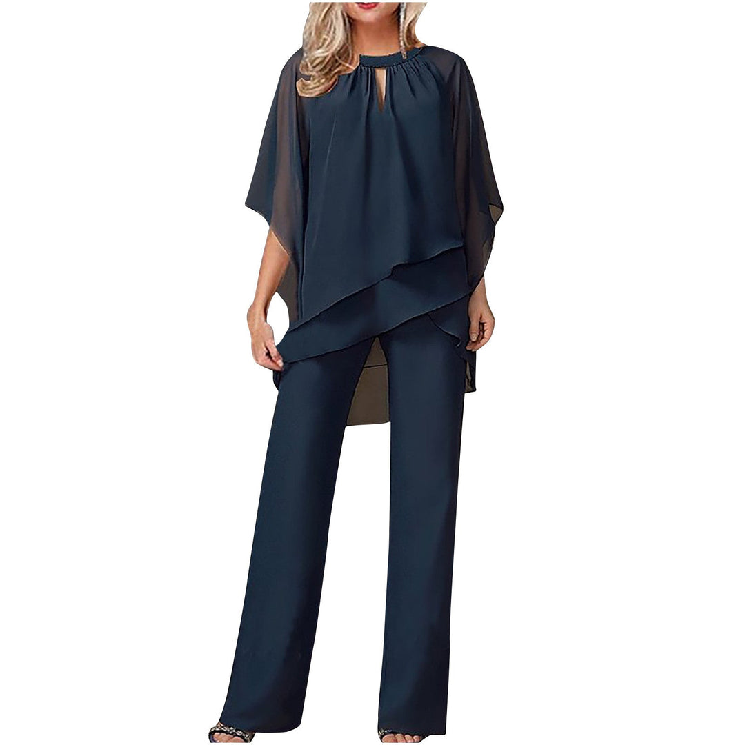 Elegant Kvinna Ensemble med Asymmetrisk Topp &amp; Bred Byxa