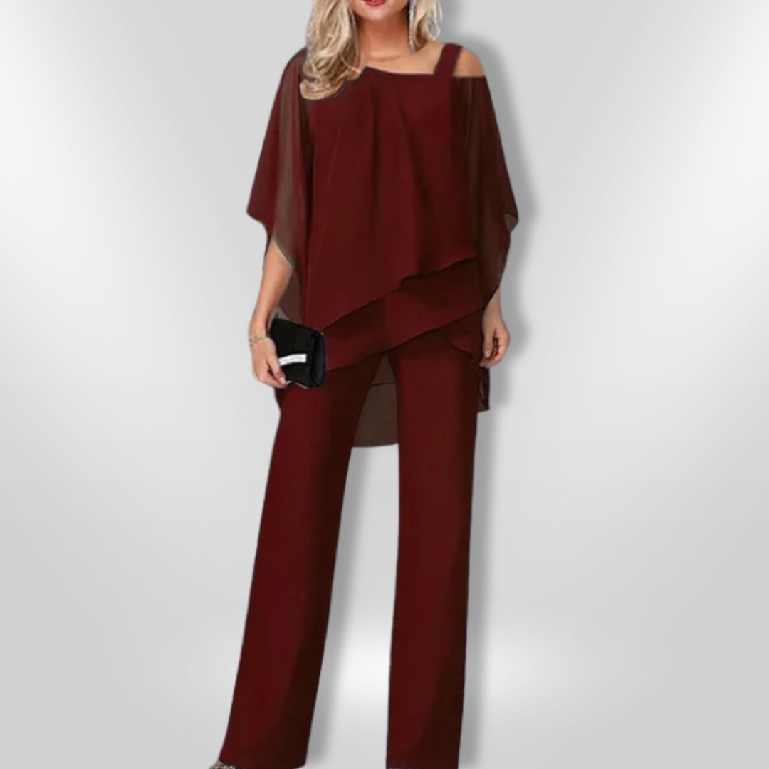 Elegant Kvinna Ensemble med Asymmetrisk Topp &amp; Bred Byxa