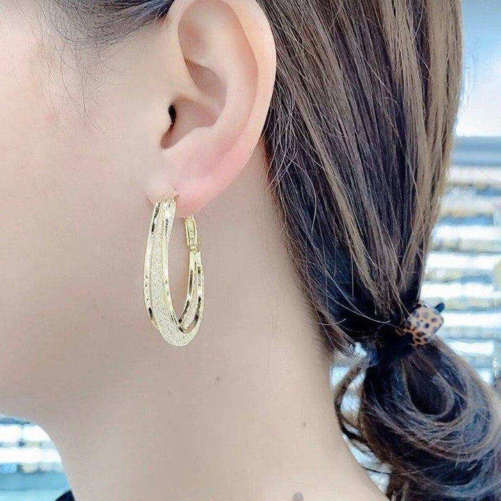 Trendig Ovale Öreringer - Glamouröst Design i Guld och Silver