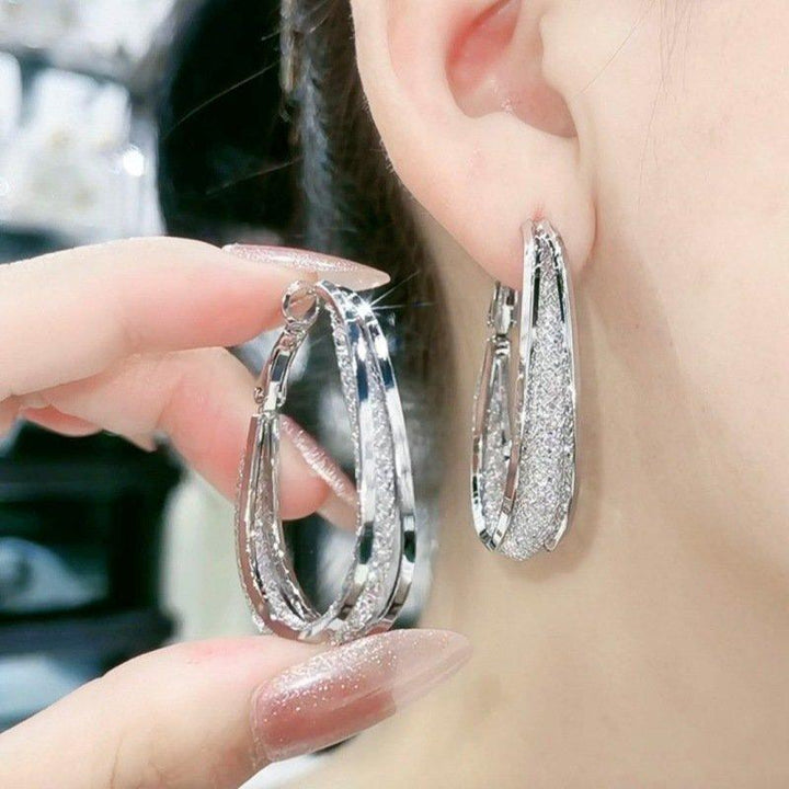 Trendig Ovale Öreringer - Glamouröst Design i Guld och Silver